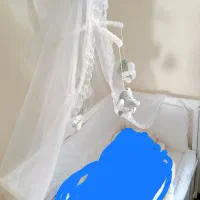 گهواره کنار مادر