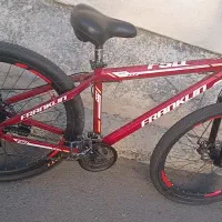 دوچرخه سایز 29 خوش رنگ قرمز 24 دنده و ترمز دیسکی