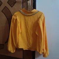 تعدادی مانتو وشومیز