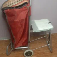 چرخ خرید صندلی دار