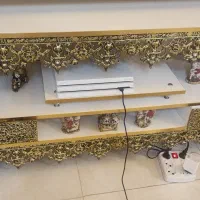 ساعت برنجی ،بوفه برنجی ،میز تلویزیون برنجی .سطل