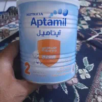 قوطی خالی شیرخشک آپتامیل۲ به همراه درب پیمانه