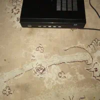 یک ساعت مسی و یک عدد دستگاه مبدل دیجیتال