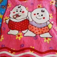 پتو و لباس کودک