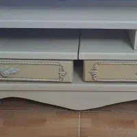 میزتلوزیون وامکان بزرگ کوچیک شدن وتغییر حالت داره