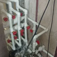 تاسیسات لوله کشی آب و فاضلاب نشت یابی نصب پمپ منبع