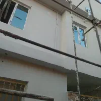 سیمان کاری دیوار سیاه و سفید