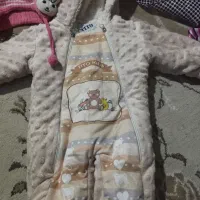 یک سرهمی وکلاه و شال گردن