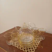 قوری دمنوش + ۶ عدد استکان نعلبکی کمر باریک