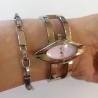 ساعت استیل OMAX اصل قدیمی عتیقه ودستبند  ورساچه