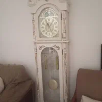 ساعت ایستاده و صندلی راکی