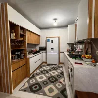 65متری-دوخواب-پارکینگ-فول-دیزاین-تی-وی-وال