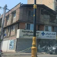 دوباب مغازه بر اصلی و یک واحد مسکونی