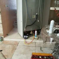 تعمیرات تخصصی یخچال لباسشویی درمنزل باضمانت