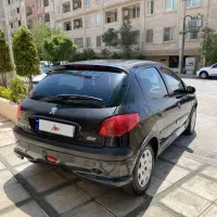 پژو 206 مشکی مرتب مدل 1382 سالم و خانگی (فرانسوی)|خودرو سواری و وانت|کرج, باغستان|دیوار
