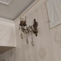 دیوار کوب برنجی