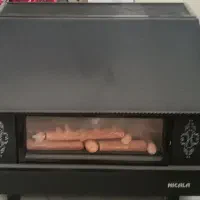 لوازم خانگی بخاری شومینه دار