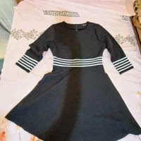 یک عدد پالتو و یک عدد لباس عروسکی دخترانه
