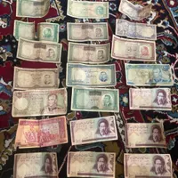 تعدادی اسکناس و سکه شاهنشاهی