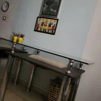 میز شیشه ای و صندلی