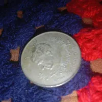 معاوضه سکه نقره عتیقه شاهی با گوشی