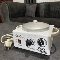 دستگاه وکس و اپلاسیون