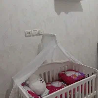 تخت نوزاد گهواره دار