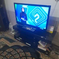 میز تلویزیون شیشهای دودی