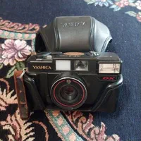 باسلام یک عدد دوربین عکاسی