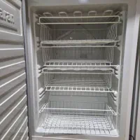 دو عدد یخچال فریزر با دوچرخه ورزشی