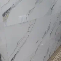 کارگر کاشیکاری و نما رومی