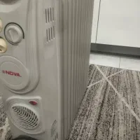 بخاری برقی. شوفاژ و رادیاتور برقی.|بخاری، هیتر، شومینه|محمدیه-قزوین, |دیوار