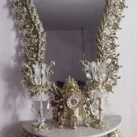 آینه و شمعدان به همراه ساعت
