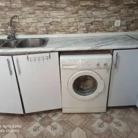 لباس شویی کنوود