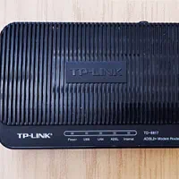 مودم وای فای TP link ۸۸۱۷ + سه کابل لند