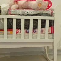 گهواره و تخت متحرک نوزاد
