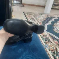 کفش نو|کیف، کفش، کمربند|صحنه, |دیوار