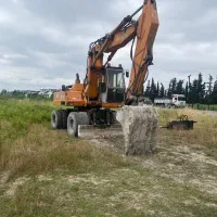 بیل مکانیکی لاستیکی