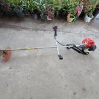 زدن علف های هرز با علف تراش