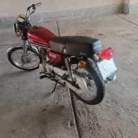 موتورسیکلت سی جی ۱۲۵ آلبالویی مزایده عروسک