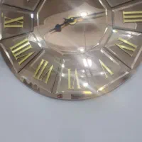 ساعت  و شمعدونی