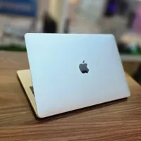 macbook pro 2017 تاچ بار در حد