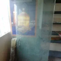درب شیشه ای همراه با یراق