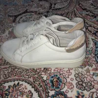 کفش سفید|کیف، کفش، کمربند|نیشابور, سرآب کوشک|دیوار