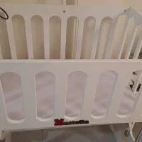 تخت کنار مادر