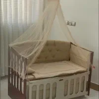 گهوار کنار تخت مادر دیوانکو