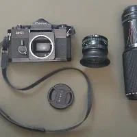 دوربین  Canon F1 (آنالوگ) همراه  دو عدد لنز|دوربین عکاسی و فیلم‌برداری|تهران, لاله زار|دیوار