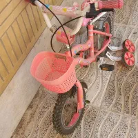 دوچرخه دخترانه سایز ۱۲ با کمکی