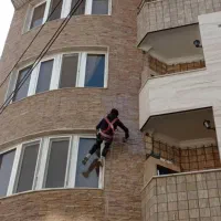 عایق کاری پشت بام و نما ساختمان با طناب راپل کار