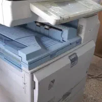 دستگاه پرینت کونیکا ۴۵۲ در حال کار و  Rico5000